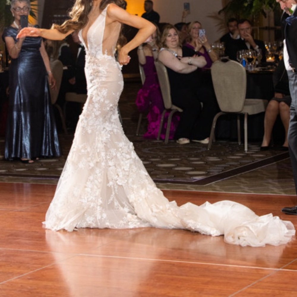 HOTTEST WEDDING DRESS EVER. Size 36 on tag but Poshmark didn’t have that option